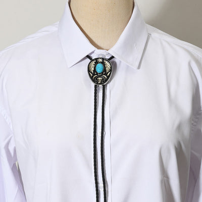 Oval Turquoise Black-and-white Carved Metal Bolo Ties - image 1