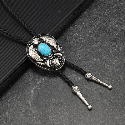 Oval Turquoise Black-and-white Carved Metal Bolo Ties - image 2