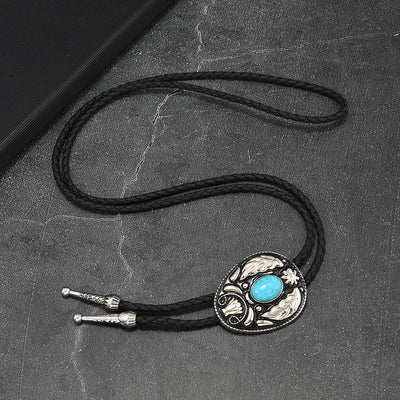 Oval Turquoise Black-and-white Carved Metal Bolo Ties - image 3
